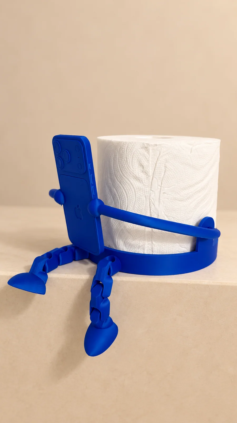Porta rotolo blu con supporto smartphone e gambe articolate