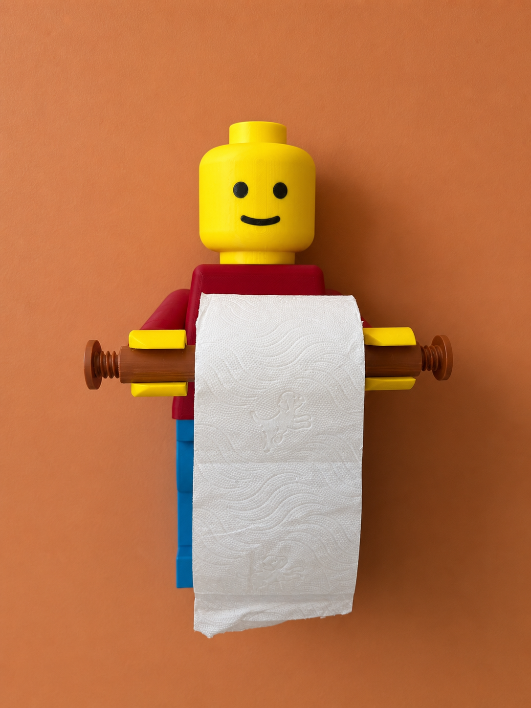 Porta rotolo a parete a forma di omino a mattoncini con rotolo montato